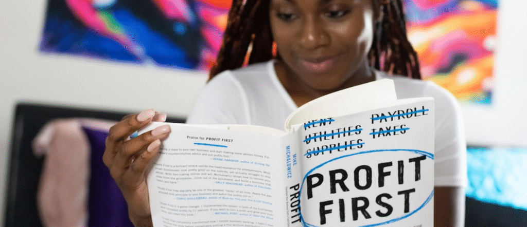 Financial Literacy Tools for Gig Economy Workers in 2025 Financial literacy tools for gig economy workers in 2025 – freelancer checking budgeting app on smartphone with laptop, coffee, and earnings dashboard on screen