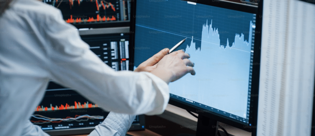 A vibrant city skyline at dawn, with glowing digital stock charts and graphs rising like skyscrapers against a wave-like market backdrop, symbolizing resilient growth and strategic investing in 2025.